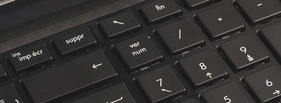 Voici une belle touche VER. NUM sur un clavier HP. Pensez à l'activer pour que le pavé numérique fonctionne. 